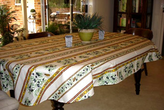 Oval beige coated French provencal tablecloth
