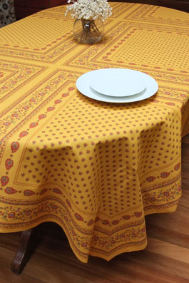 traditional provencal tablecloth with ochre and burgundy tones