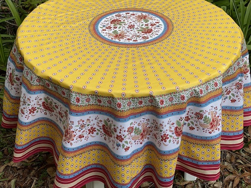 yellow and pink coated round tablecloth from provence