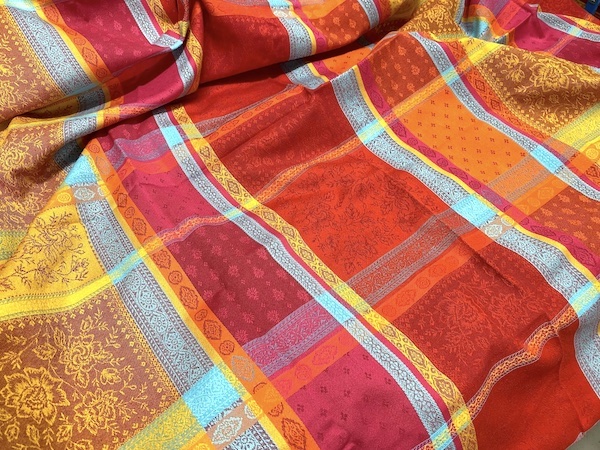 french Jacquard tablecloth with hot pink, blue and yellow tones