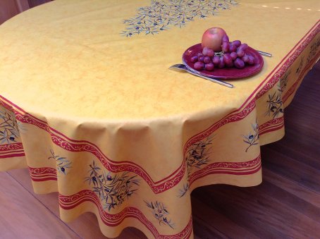 oilcloth from France yellow with olive designs