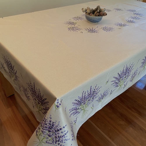 french tablecloth with lavender design on a light grey background